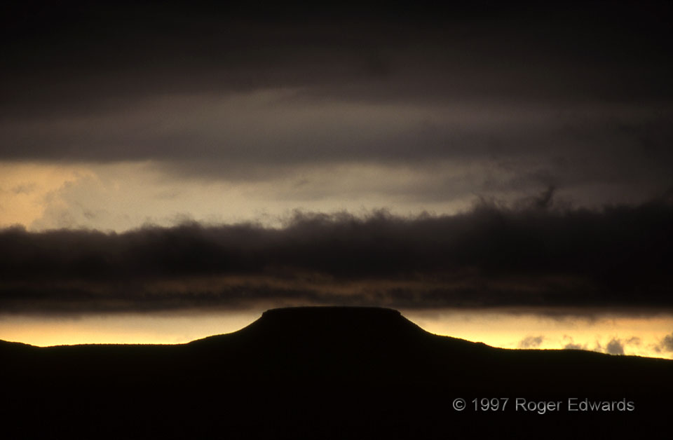 Silhouetted Stratus over a Butte
